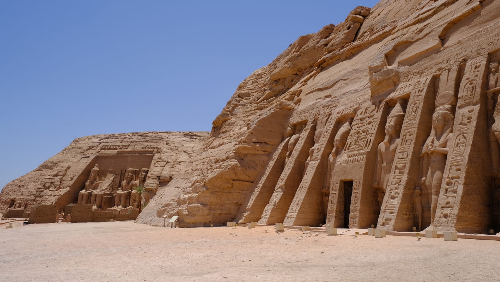 Both Abu Simbel temples in the sandstone cliff