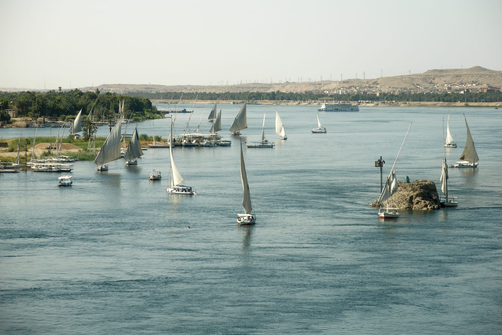 Traditional felucca sailing boats on the Nile at Aswan