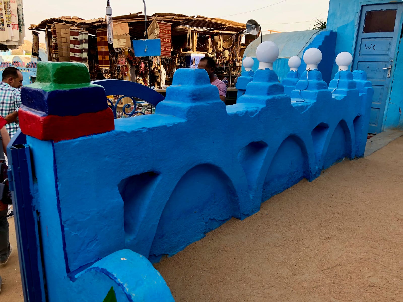 Brightly painted blue Nubian houses near Aswan